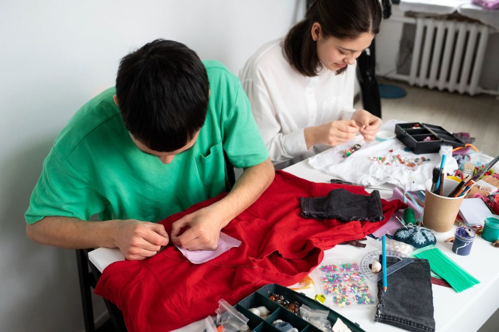 two workers manufacturing clothes